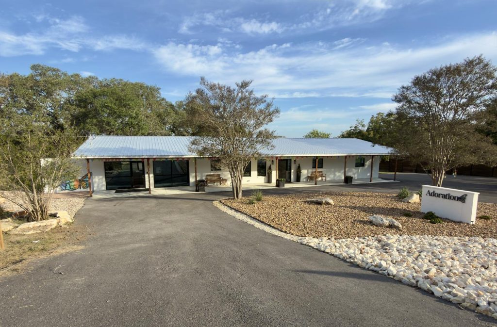Adoration office in New Braunfels, TX, with the curved drive and monument sign