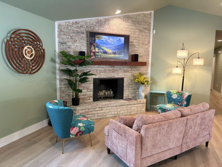 Adoration lounge with fireplace and comfortable seating