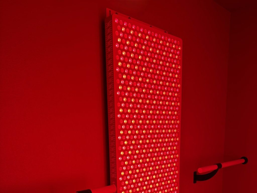 Red light panel on the wall at Adoration